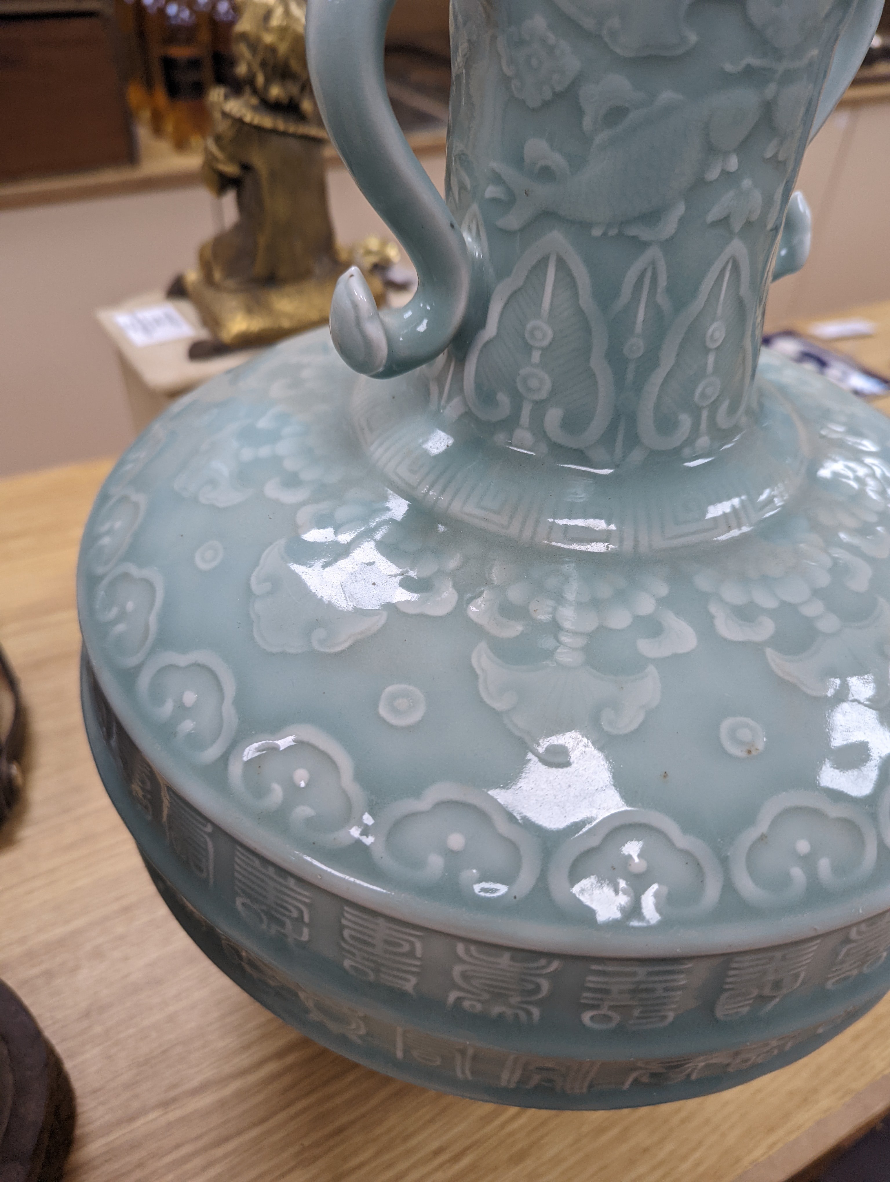 A large Chinese celadon glazed ‘Hundred Shou’ vase 41cm